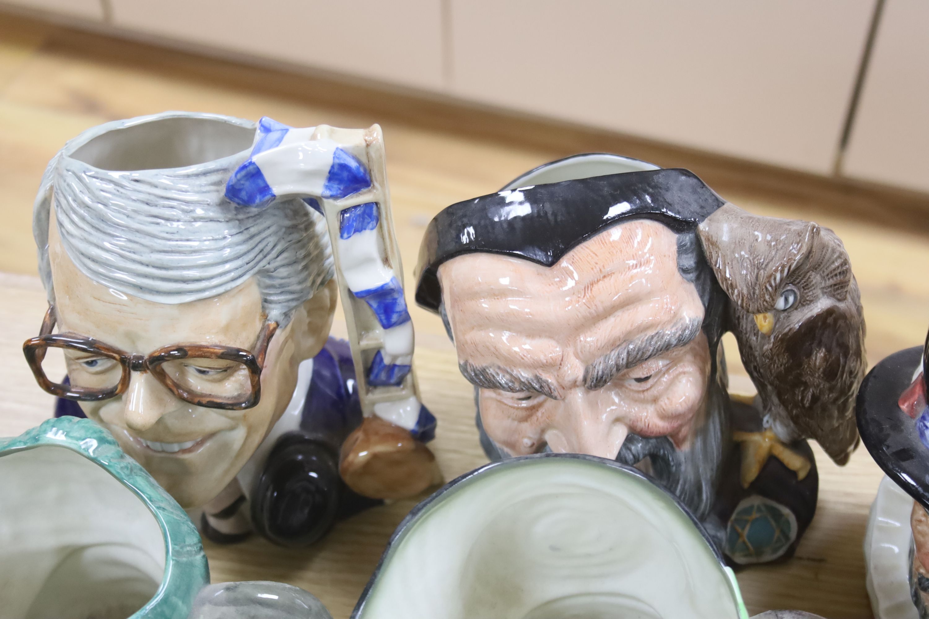 A collection of seventeen Royal Doulton character mugs